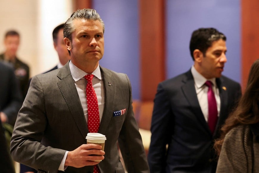 U.S. Defense Secretary Pete Hegseth walks on the day of a classified briefing for all senators on the situation in Venezuela, on Capitol Hill in Washington, D.C., U.S., December 16, 2025. REUTERS/Kevin Mohatt