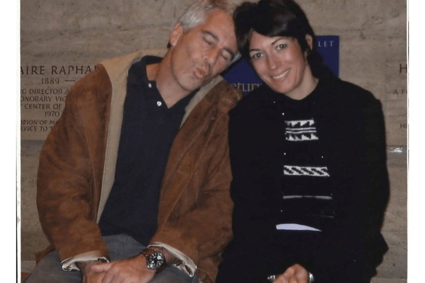 Jeffrey Epstein and Ghislaine Maxwell are seen in this image released by the Department of Justice in Washington, D.C., U.S., on December 19, 2025 as part of a new trove of documents from its investigations into the late financier and convicted sex offender Jeffrey Epstein. U.S. Justice Department/Handout via REUTERS   THIS IMAGE HAS BEEN SUPPLIED BY A THIRD PARTY