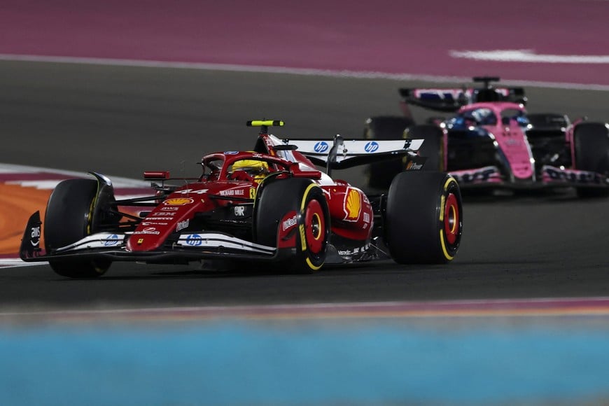 Formula One F1 - Qatar Grand Prix - Lusail International Circuit, Lusail, Qatar - November 29, 2025
Ferrari's Lewis Hamilton and Alpine's Pierre Gasly in action during the sprint race REUTERS/Mohammed Salem