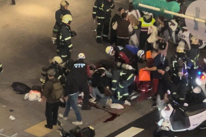 Emergency personnel assist a person, following an attack by a man suspected of carrying a smoke grenade and a knife on a street in Taipei, Taiwan, December 19, 2025, in this screen grab obtained from social media video. Instagram @hsinnan0831/via REUTERS  THIS IMAGE HAS BEEN SUPPLIED BY A THIRD PARTY. MANDATORY CREDIT. NO RESALES. NO ARCHIVES.

VERIFICATION:- Reuters was able to confirm the location from buildings, business signages, road layout and traffic light pole that matched file imagery of the area. Date of the video was verified from original file metadata