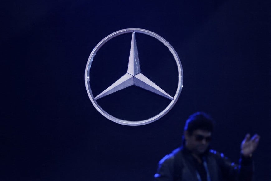 FILE PHOTO: A man walks past the logo of Mercedes-Benz at Bharat Mobility Global Expo organised by India's commerce ministry at Pragati Maidan in New Delhi, India, February 1, 2024. REUTERS/Anushree Fadnavis/File Photo