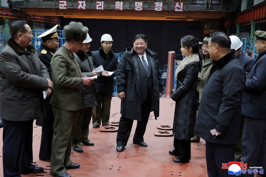 North Korean leader Kim Jong Un visits the construction site of an 8,700-ton nuclear-powered submarine capable of launching surface-to-air missiles in this picture released by North Korea's official Korean Central News Agency on December 25, 2025. KCNA via REUTERS    ATTENTION EDITORS - THIS IMAGE WAS PROVIDED BY A THIRD PARTY. REUTERS IS UNABLE TO INDEPENDENTLY VERIFY THIS IMAGE. NO THIRD PARTY SALES. SOUTH KOREA OUT. NO COMMERCIAL OR EDITORIAL SALES IN SOUTH KOREA.