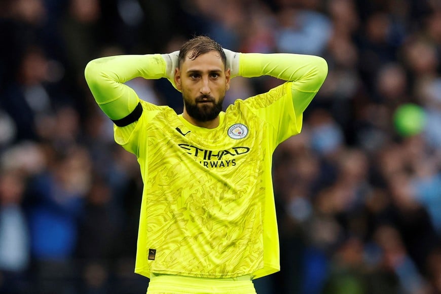 Soccer Football - Premier League - Manchester City v Manchester United - Etihad Stadium, Manchester, Britain - September 14, 2025
Manchester City's Gianluigi Donnarumma reacts Action Images via Reuters/Jason Cairnduff EDITORIAL USE ONLY. NO USE WITH UNAUTHORIZED AUDIO, VIDEO, DATA, FIXTURE LISTS, CLUB/LEAGUE LOGOS OR 'LIVE' SERVICES. ONLINE IN-MATCH USE LIMITED TO 120 IMAGES, NO VIDEO EMULATION. NO USE IN BETTING, GAMES OR SINGLE CLUB/LEAGUE/PLAYER PUBLICATIONS. PLEASE CONTACT YOUR ACCOUNT REPRESENTATIVE FOR FURTHER DETAILS..