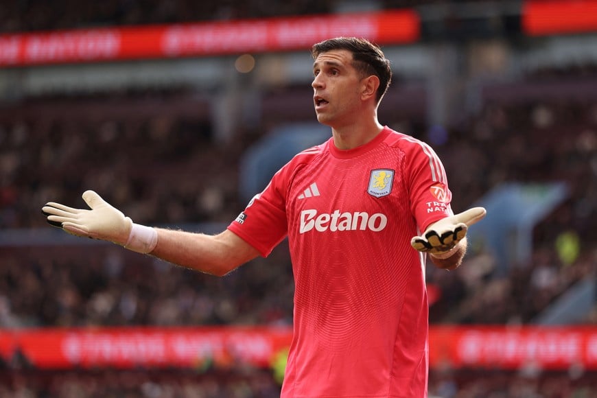 Soccer Football - Premier League - Aston Villa v Burnley - Villa Park, Birmingham, Britain - October 5, 2025
Aston Villa's Emiliano Martinez reacts REUTERS/David Klein EDITORIAL USE ONLY. NO USE WITH UNAUTHORIZED AUDIO, VIDEO, DATA, FIXTURE LISTS, CLUB/LEAGUE LOGOS OR 'LIVE' SERVICES. ONLINE IN-MATCH USE LIMITED TO 120 IMAGES, NO VIDEO EMULATION. NO USE IN BETTING, GAMES OR SINGLE CLUB/LEAGUE/PLAYER PUBLICATIONS. PLEASE CONTACT YOUR ACCOUNT REPRESENTATIVE FOR FURTHER DETAILS..