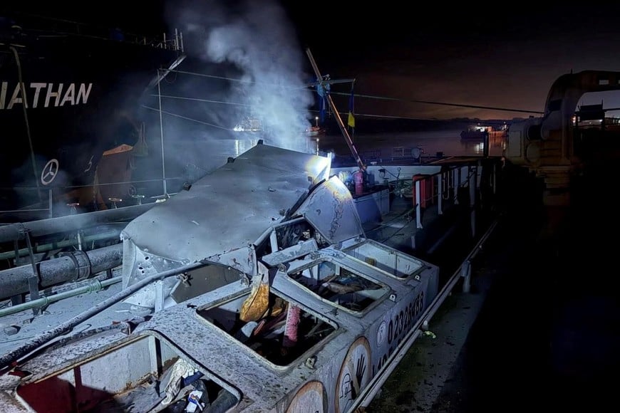 Smoke rises over a vessel which was damaged during an overnight Russian drone strikes, amid Russia's attack on Ukraine, in a port in Odesa region, Ukraine December 26, 2025. Deputy Prime Minister for Restoration of Ukraine – Minister for Communities and Territories Development of Ukraine Oleksii Kuleba via Facebook/Handout via REUTERS ATTENTION EDITORS - THIS IMAGE HAS BEEN SUPPLIED BY A THIRD PARTY. NO RESALES. NO ARCHIVES. BEST QUALITY AVAILABLE.