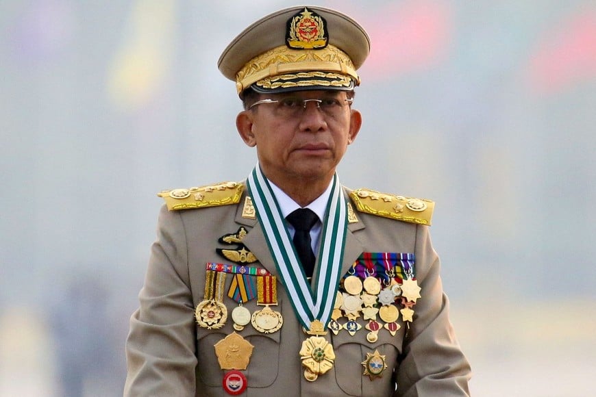 FILE PHOTO: FILE PHOTO: Myanmar's junta chief Senior General Min Aung Hlaing, who ousted the elected government in a coup, presides at an army parade on Armed Forces Day in Naypyitaw, Myanmar, March 27, 2021. REUTERS/Stringer//File Photo/File Photo