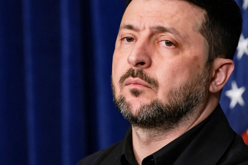 Ukrainian President Volodymyr Zelenskiy looks on during a press conference with U.S. President Donald Trump after their lunch meeting at Trump's Mar-a-Lago club, in Palm Beach, Florida, U.S., December 28, 2025. REUTERS/Jonathan Ernst