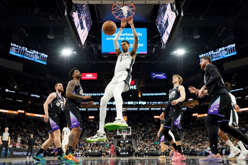 Dec 27, 2025; San Antonio, Texas, USA; San Antonio Spurs forward Victor Wembanyama (1) dunks during the second half against the Utah Jazz at Frost Bank Center. Mandatory Credit: Scott Wachter-Imagn Images