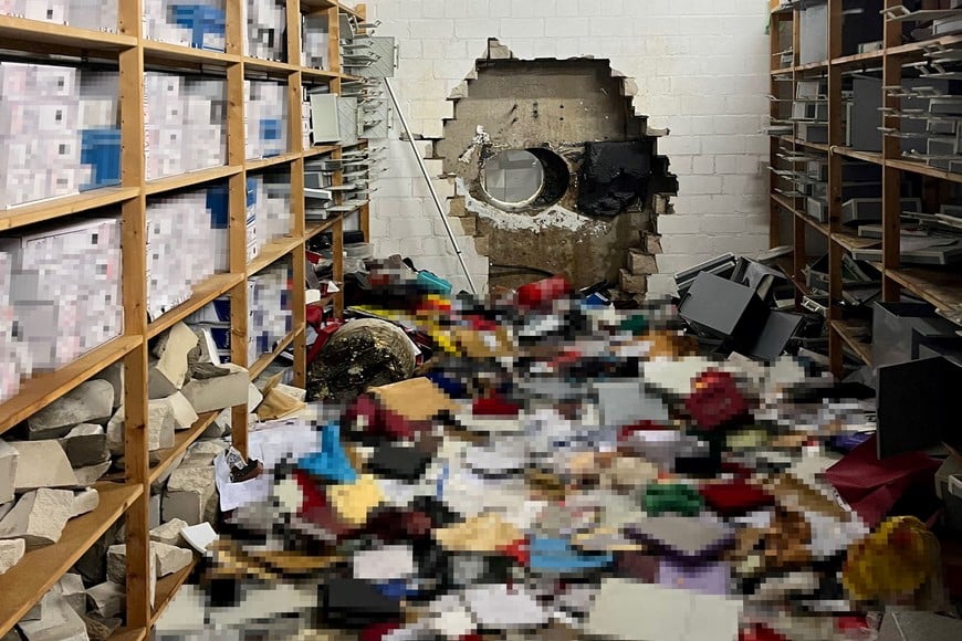 A hole gapes in a wall after thieves drilled into the vault of a Sparkasse savings bank in Gelsenkirchen, Germany, December 29, 2025, in this image released December 30, 2025, by the police. Police Gelsenkirchen/Handout via REUTERS
ATTENTION EDITORS - PICTURE PIXELATED BY POLICE. THIS IMAGE HAS BEEN SUPPLIED BY A THIRD PARTY. NO RESALES. NO ARCHIVES.