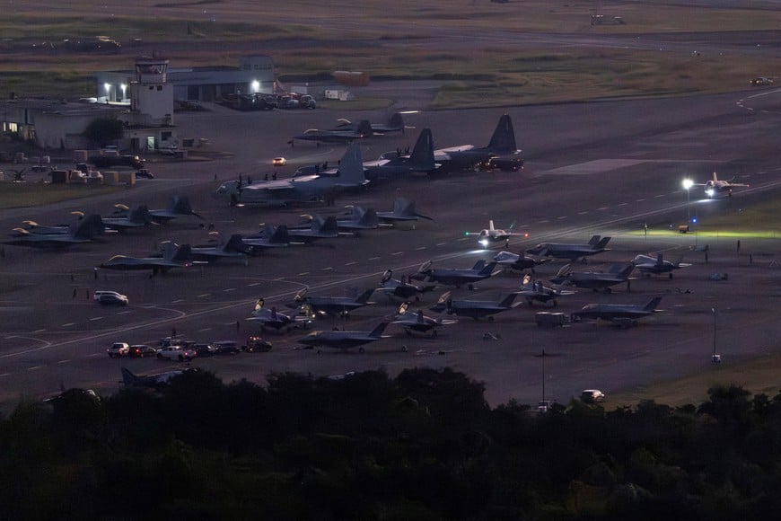 F-22, C-130 and F-35 aircraft are seen at the former Roosevelt Roads naval base, after U.S. President Donald Trump said on Saturday the U.S. has struck Venezuela and captured its President Nicolas Maduro, in Ceiba, Puerto Rico, January 3, 2026. REUTERS/Eva Marie Uzcategui