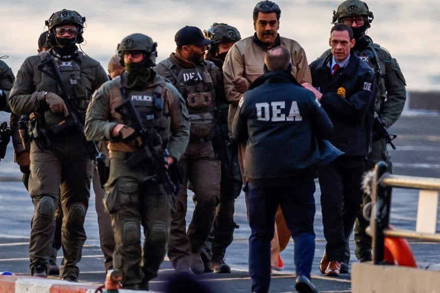 Captured Venezuelan President Nicolas Maduro arrives at the Downtown Manhattan Heliport, as he heads towards the Daniel Patrick Manhattan United States Courthouse for an initial appearance to face U.S. federal charges including narco-terrorism, conspiracy, drug trafficking, money laundering and others in New York City, U.S., January 5, 2026. REUTERS/Eduardo Munoz
