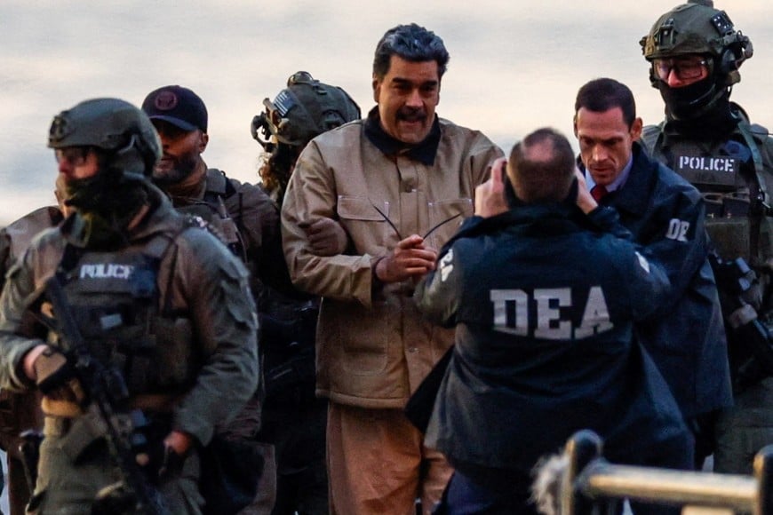 Captured Venezuelan President Nicolas Maduro arrives at the Downtown Manhattan Heliport, as he heads towards the Daniel Patrick Manhattan United States Courthouse for an initial appearance to face U.S. federal charges including narco-terrorism, conspiracy, drug trafficking, money laundering and others in New York City, U.S., January 5, 2026. REUTERS/Eduardo Munoz