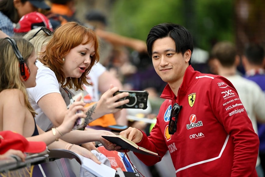 Formula One F1 - Australian Grand Prix - Albert Park Grand Prix Circuit, Melbourne, Australia - March 13, 2025
Ferrari's reserve driver Zhou Guanyu arrives to the Albert Park Grand Prix Circuit ahead of the Australian Grand Prix REUTERS/Tracey Nearmy