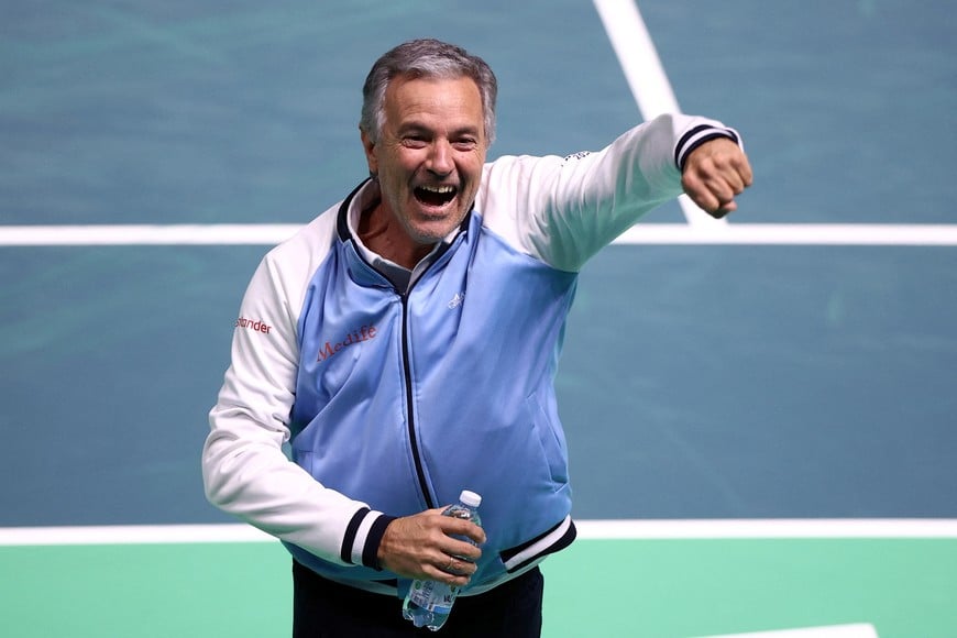 Tennis - Davis Cup - Final 8 - Argentina v Germany - SuperTennis Arena, Bologna, Italy - November 20, 2025  
Argentina captain Javier Frana celebrates after Tomas Martin Etcheverry won his match against Germany's Jan-Lennard Struff REUTERS/Guglielmo Mangiapane