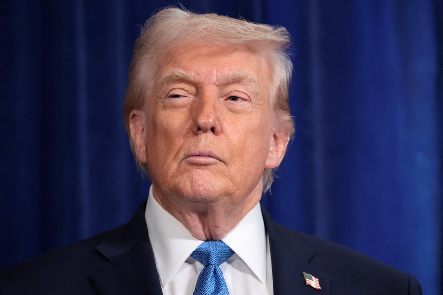 U.S. President Donald Trump looks on during a press conference following a U.S. strike on Venezuela where President Nicolas Maduro and his wife, Cilia Flores, were captured, from Trump's Mar-a-Lago club in Palm Beach, Florida, U.S., January 3, 2026. REUTERS/Jonathan Ernst