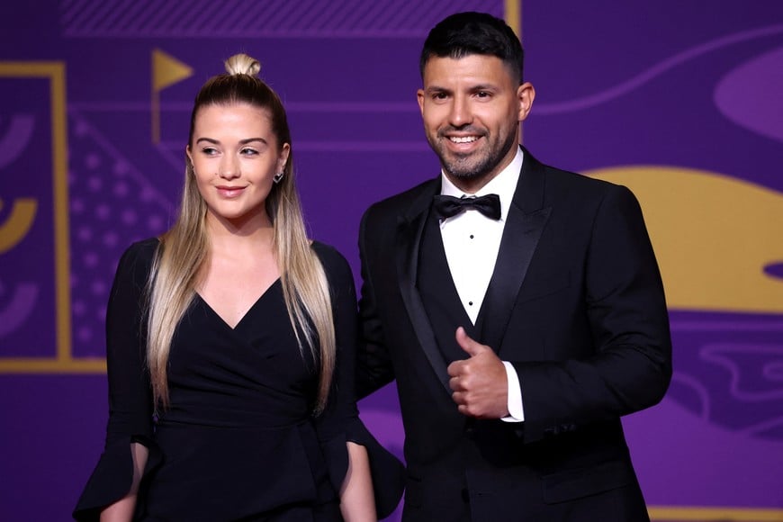 Soccer Football - World Cup - Final Draw - Doha Exhibition & Convention Center, Doha, Qatar - April 1, 2022
Former player Sergio Aguero and his girlfriend Sofia Calzetti arrive ahead of the draw REUTERS/Carl Recine