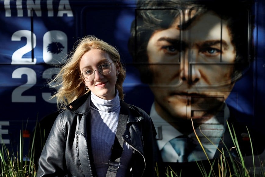 Eugenia Rolon, an influencer who works pro-bono in Argentine presidential candidate for La Libertad Avanza party Javier Milei's campaign, poses for a picture during a campaign rally, in Buenos Aires, Argentina September 25, 2023. REUTERS/Cristina Sille