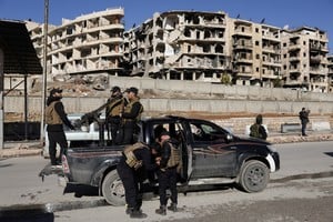 Members of the general security forces gather at the Sheikh Maksoud neighbourhood after taking control of the area, following the collapse of an agreement between the Syrian government and the Syrian Democratic Forces (SDF), in Aleppo, Syria, January 10, 2026. REUTERS/Khalil Ashawi