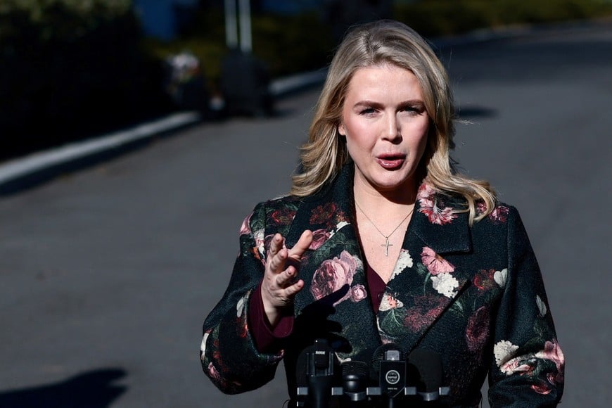 White House Press Secretary Karoline Leavitt speaks to the members of the media outside the White House in Washington, D.C., U.S., January 12, 2026. REUTERS/Evelyn Hockstein