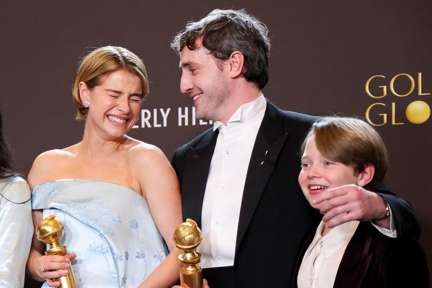 Jessie Buckley, Paul Mescal, and Jacobi Jupe pose with the Best Motion Picture - Drama award for "Hamnet"at the 83rd Annual Golden Globes in Beverly Hills, California, U.S., January 11, 2026. REUTERS/Mario Anzuoni     TPX IMAGES OF THE DAY