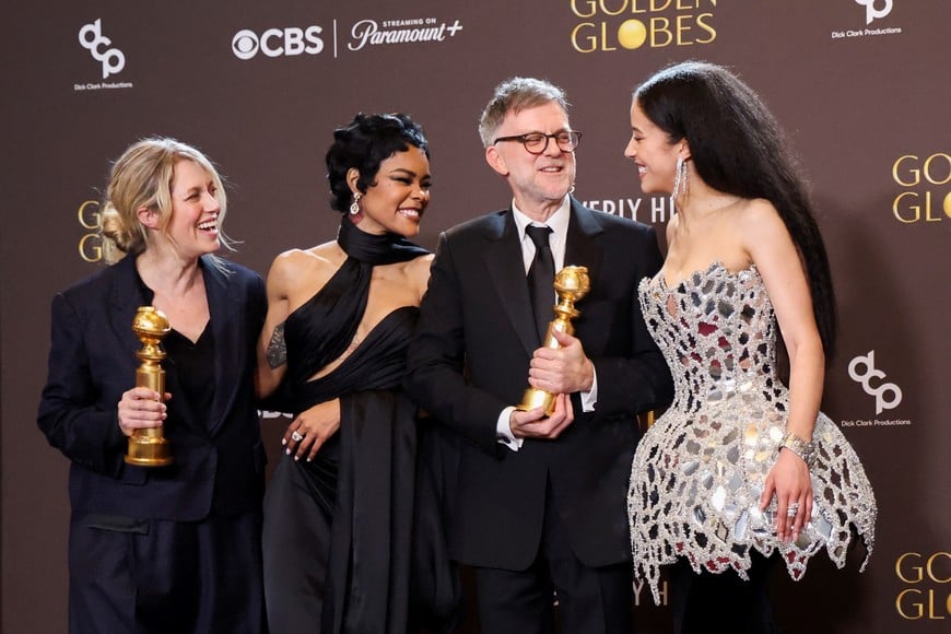 Sara Murphy, Teyana Taylor, Paul Thomas Anderson and Chase Infiniti pose with the Best Motion Picture - Musical or Comedy award for "One Battle After Another" at the 83rd Annual Golden Globes in Beverly Hills, California, U.S., January 11, 2026. REUTERS/Mario Anzuoni