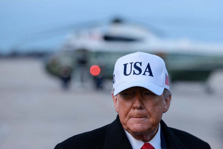 U.S. President Donald Trump returns from Detroit, Michigan, at Joint Base Andrews, Maryland, U.S., January 13, 2026. REUTERS/Evelyn Hockstein
