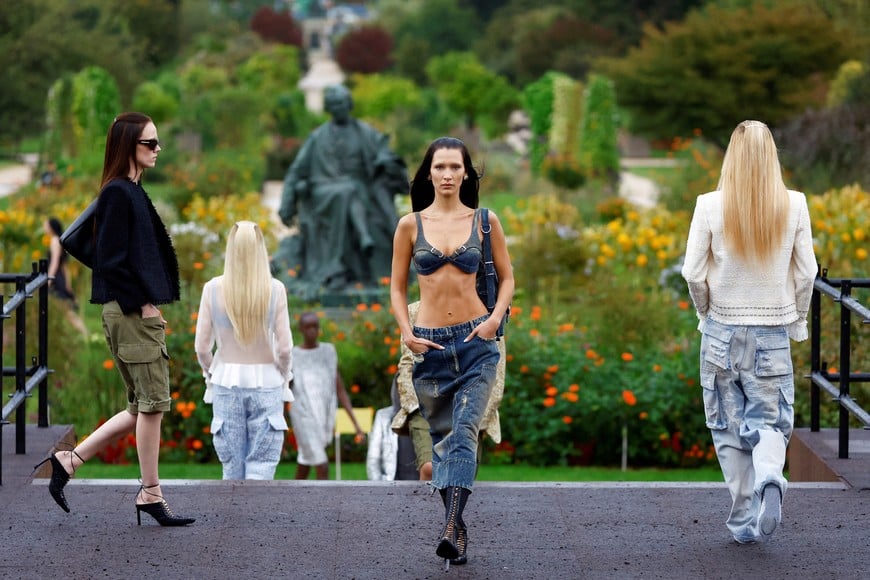 Model Bella Hadid presents creation by designer Matthew Williams as part of his Spring-Summer 2023 Women's ready-to-wear collection show for fashion house Givenchy during Paris Fashion Week in Paris, France, October 2, 2022. REUTERS/Christian Hartmann