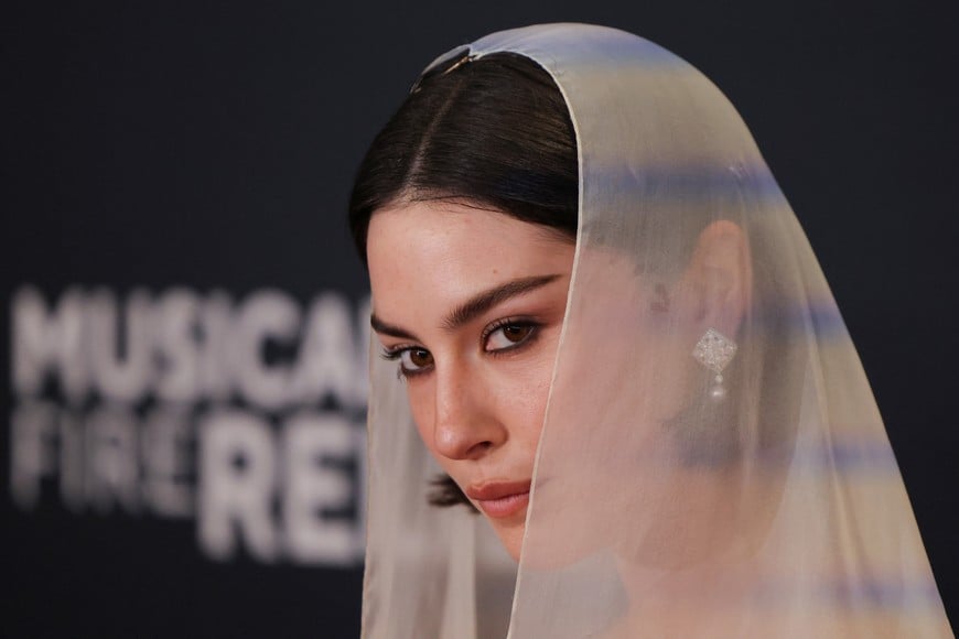 Gracie Abrams poses at the red carpet during the 67th Annual Grammy Awards in Los Angeles, California, U.S., February 2, 2025. REUTERS/Daniel Cole