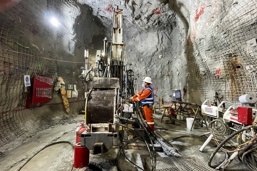 A worker operates a drill inside the Gualcamayo gold mine, targeting the deep carbonates body to advance underground exploration, in Jachal, Argentina August 6, 2025. REUTERS/Lucila Sigal