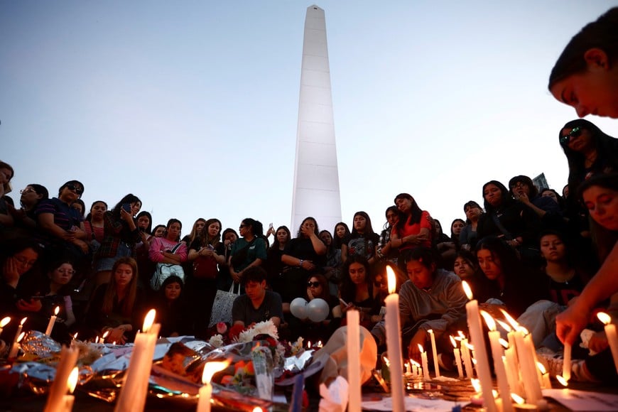 People gather after Liam Payne, former One Direction band member, was found dead after he fell from a third-floor hotel room balcony, in Buenos Aires, Argentina, October 17, 2024. REUTERS/Tomas Cuesta