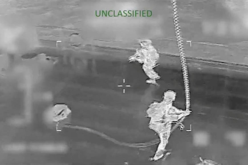 Footage from a video released by US Southern Command shows U.S. military personnel aboard the Venezuela-linked tanker Veronica at sea, in this screen grab taken from a handout video released on January 15, 2026. US SOUTHERN COMMAND/Handout via REUTERS. THIS IMAGE HAS BEEN SUPPLIED BY A THIRD PARTY. MANDATORY CREDIT. TEXT OVERLAY AND BLURRING FROM SOURCE.

VERIFICATION:
- Structures on the deck, bridge, crane, and smokestack matched file imagery of the vessel
- Date and location not verified 
- However, U.S. officials told Reuters seizure happened on Thursday (January 15)
- U.S. military's Southern Command identified the tanker as Veronica