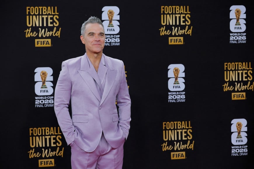Soccer Football - FIFA World Cup 2026 - FIFA World Cup 2026 Draw - John F. Kennedy Center for the Performing Arts, Washington, D.C., U.S. - December 5, 2025
Musician Robbie Williams arrives on the red carpet ahead of the FIFA World Cup 2026 Draw REUTERS/Brian Snyder