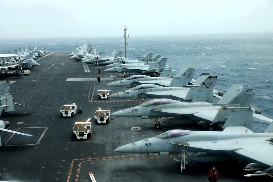 F/A-18F aircrafts are seen on the deck of USS Abraham Lincoln in the Gulf of Oman near the Strait of Hormuz July 15, 2019. Picture taken July 15, 2019. REUTERS/Ahmed Jadallah
