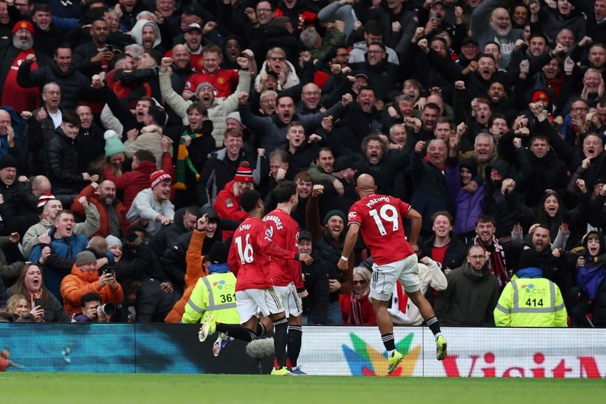 Soccer Football - Premier League - Manchester United v Manchester City - Old Trafford, Manchester, Britain - January 17, 2026
Manchester United's Bryan Mbeumo celebrates scoring their first goal with Bruno Fernandes and Amad Diallo REUTERS/Phil Noble EDITORIAL USE ONLY. NO USE WITH UNAUTHORIZED AUDIO, VIDEO, DATA, FIXTURE LISTS, CLUB/LEAGUE LOGOS OR 'LIVE' SERVICES. ONLINE IN-MATCH USE LIMITED TO 120 IMAGES, NO VIDEO EMULATION. NO USE IN BETTING, GAMES OR SINGLE CLUB/LEAGUE/PLAYER PUBLICATIONS. PLEASE CONTACT YOUR ACCOUNT REPRESENTATIVE FOR FURTHER DETAILS..