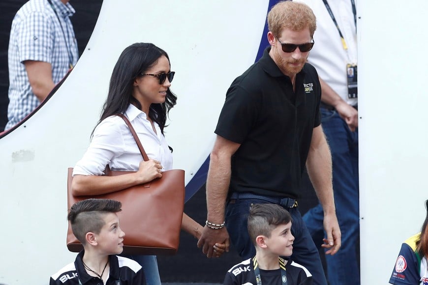 Britain's Prince Harry (R) arrives with girlfriend actress Meghan Markle at the wheelchair tennis event during the Invictus Games in Toronto, Ontario, Canada September 25, 2017.   REUTERS/Mark Blinch canada Principe Harry de inglaterra Meghan Markle Juegos Invictus romance pareja novios principe ingles actriz norteamericana