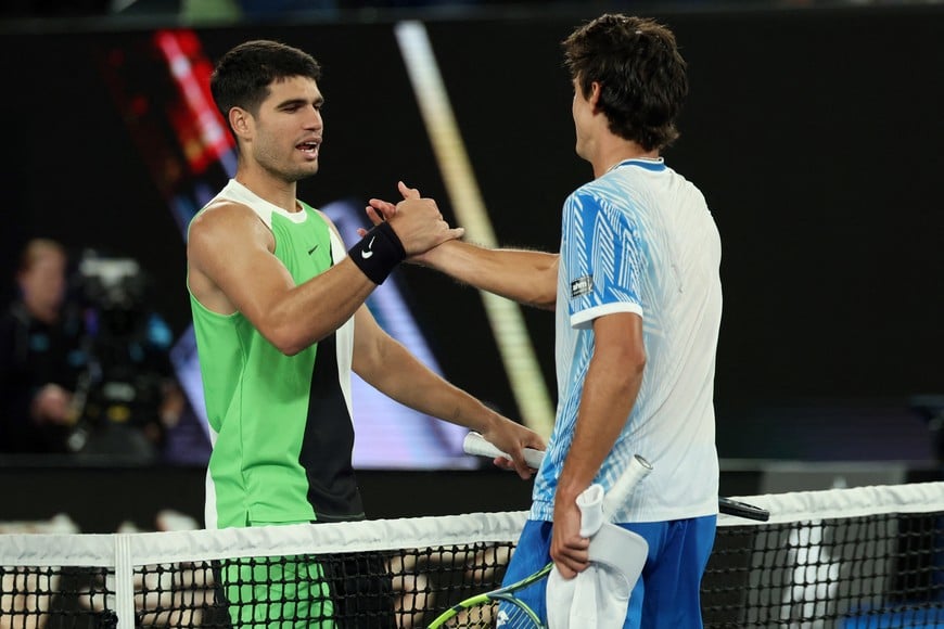 Tennis - Australian Open - Melbourne Park, Melbourne, Australia - January 18, 2026
Spain's Carlos Alcaraz and Australia's Adam Walton shake hands after their first round match REUTERS/Hollie Adams