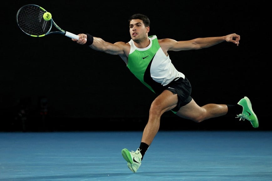 Tennis - Australian Open - Melbourne Park, Melbourne, Australia - January 18, 2026
Spain's Carlos Alcaraz in action during his first round match against Australia's Adam Walton REUTERS/Hollie Adams     TPX IMAGES OF THE DAY