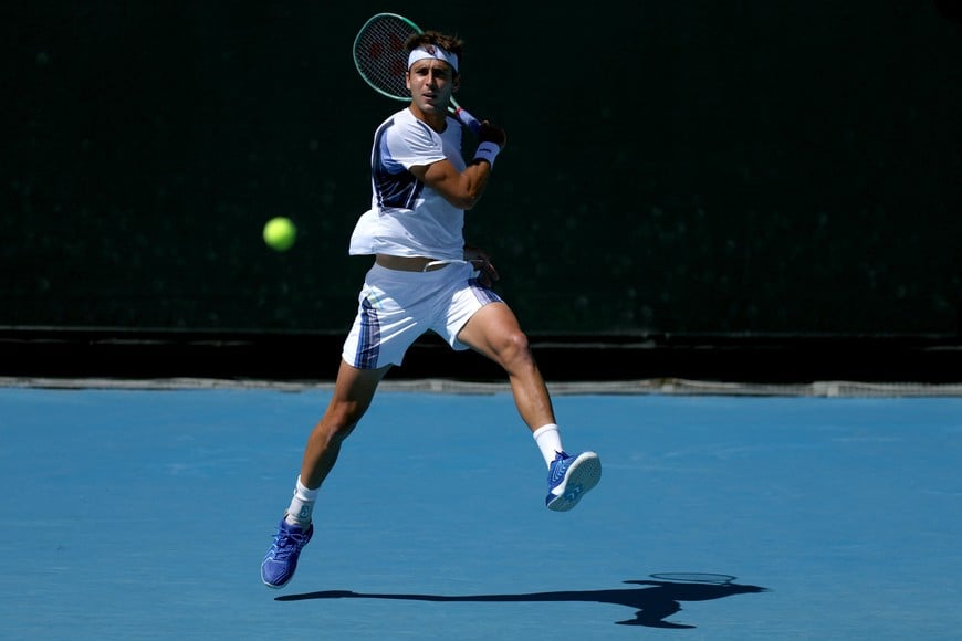 Tennis - Australian Open - Melbourne Park, Melbourne, Australia - January 18, 2026
Argentina's Tomas Martin Etcheverry in action during his first round match against Serbia's Miomir Kecmanovic REUTERS/Edgar Su