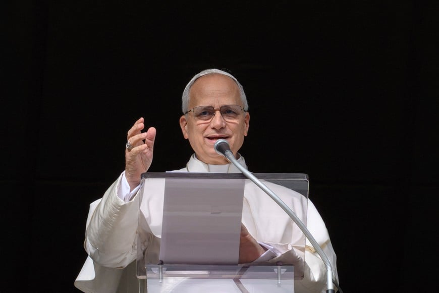 Pope Leo XIV leads the Angelus prayer from the window of the Apostolic Palace at the Vatican, January 4, 2026.   Vatican Media/Elisabetta Trevisan/Handout via REUTERS    ATTENTION EDITORS - THIS IMAGE WAS PROVIDED BY A THIRD PARTY.