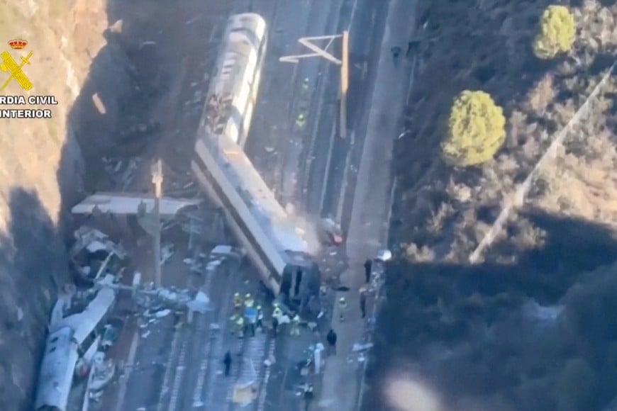 An aerial view shows emergency personnel at the scene of a deadly crash of two high-speed trains near Adamuz, in Cordoba, Spain, January 19, 2026 in this screengrab taken from a video. Guardia Civil/via Reuters TV/Handout via REUTERS THIS IMAGE HAS BEEN SUPPLIED BY A THIRD PARTY. MUST NOT OBSCURE LOGO.