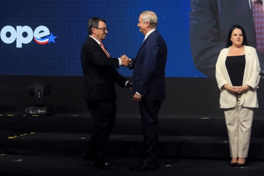 Chile's President-elect Jose Antonio Kast greets Fernando Barros as he names him the Defense Minister during the unveiling of his new cabinet, in Santiago, Chile, January 20, 2026. REUTERS/Diego Reyes