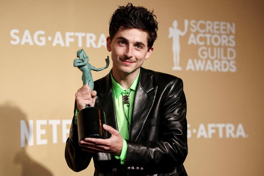 Timothee Chalamet poses with the award for Outstanding Performance by a Male Actor in a Leading Role for "A Complete Unknown" at the 31st Screen Actors Guild Awards, in Los Angeles, California, U.S., February 23, 2025. REUTERS/Daniel Cole 
     TPX IMAGES OF THE DAY