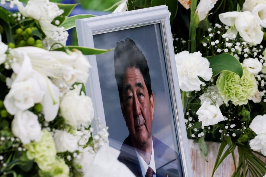 A picture of late former Japanese Prime Minister Shinzo Abe, who was shot while campaigning for a parliamentary election, is seen at Headquarters of the Japanese Liberal Democratic Party in Tokyo, Japan July 12, 2022. REUTERS/Kim Kyung-Hoon
 

     TPX IMAGES OF THE DAY