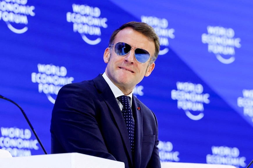 France's President Emmanuel Macron wears sunglasses as he attends the 56th annual World Economic Forum (WEF) meeting in Davos, Switzerland, January 20, 2026. REUTERS/Denis Balibouse     TPX IMAGES OF THE DAY