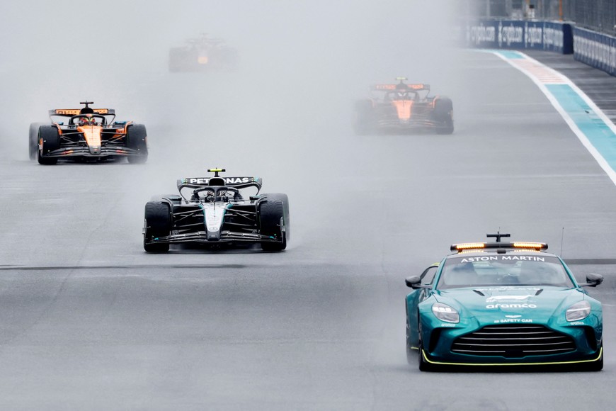 Formula One F1 - Miami Grand Prix - Miami International Autodrome, Miami, Florida, United States - May 3, 2025
A safety car leads Mercedes' Andrea Kimi Antonelli, McLaren's Oscar Piastri and McLaren's Lando Norris around the track on the formation lap of the sprint race REUTERS/Marco Bello