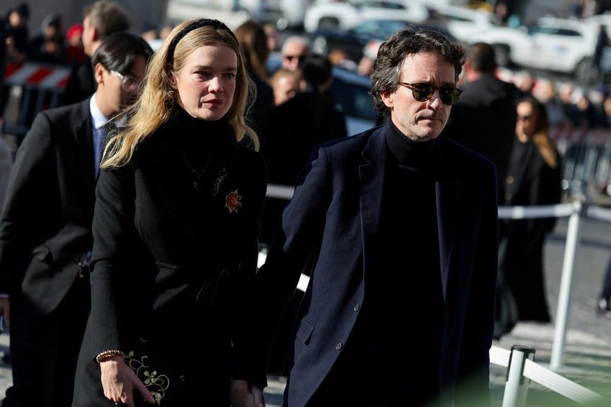 Model Natalia Vodianova and CEO of Christian Dior Antoine Arnault arrive for the funeral ceremony of fashion designer Valentino Garavani, who died at the age of 93, at the Basilica of Saint Mary of the Angels and Martyrs in Rome, Italy, January 23, 2026. REUTERS/Yara Nardi