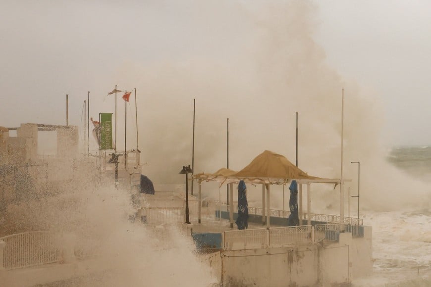 Waves lash a beach club as Storm Harry wreaks havoc across the island, in Sliema, Malta, January 20, 2026. REUTERS/Darrin Zammit Lupi     TPX IMAGES OF THE DAY