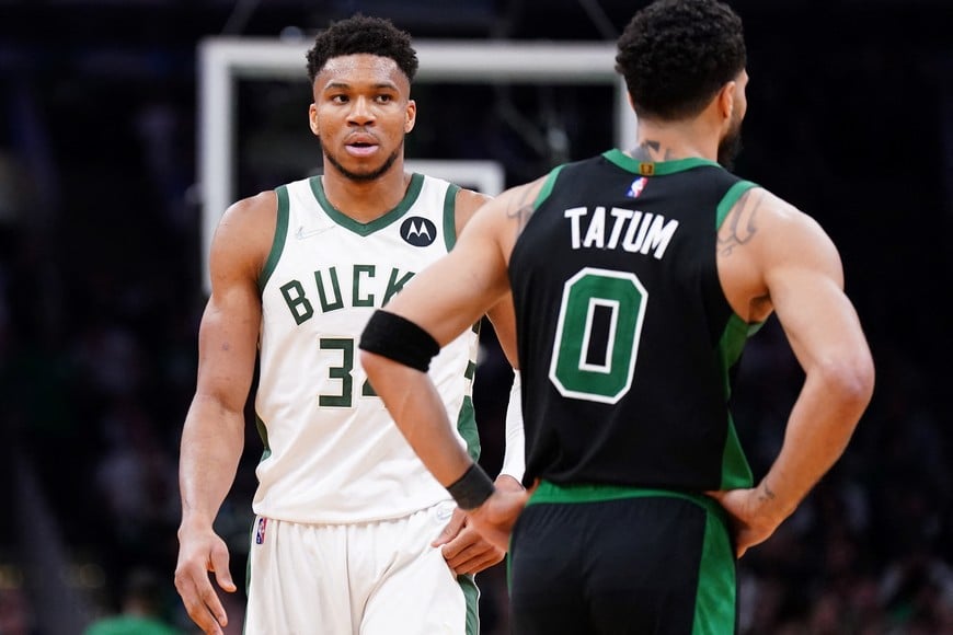 May 1, 2022; Boston, Massachusetts, USA; Milwaukee Bucks forward Giannis Antetokounmpo (34) and Boston Celtics forward Jayson Tatum (0) on the court in the second half during game one of the second round for the 2022 NBA playoffs at TD Garden. Mandatory Credit: David Butler II-USA TODAY Sports