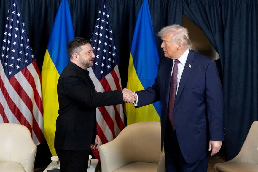 Ukraine's President Volodymyr Zelenskiy and U.S. President Donald Trump shake hands during their meeting at the sidelines of the 56th annual World Economic Forum (WEF), in Davos, Switzerland, January 22, 2026. Ukrainian Presidential Press Service/Handout via REUTERS ATTENTION EDITORS - THIS IMAGE HAS BEEN SUPPLIED BY A THIRD PARTY.