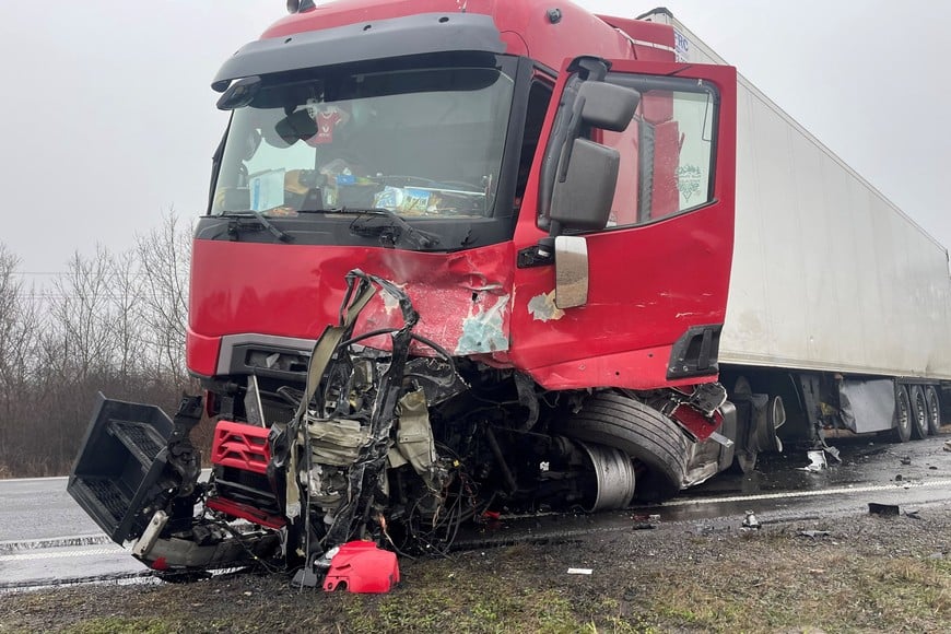 A truck involved in a road accident with a minibus carrying Greek PAOK soccer fans remains on the road at the scene near Lugoj, Romania, January 27, 2026. Lugo Info/Handout via REUTERS ATTENTION EDITORS - THIS PICTURE WAS PROVIDED BY A THIRD PARTY. NO RESALES. NO ARCHIVES.